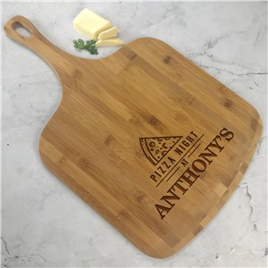 Engraved Pizza Slice on top of Pizza Night Bamboo Pizza Board